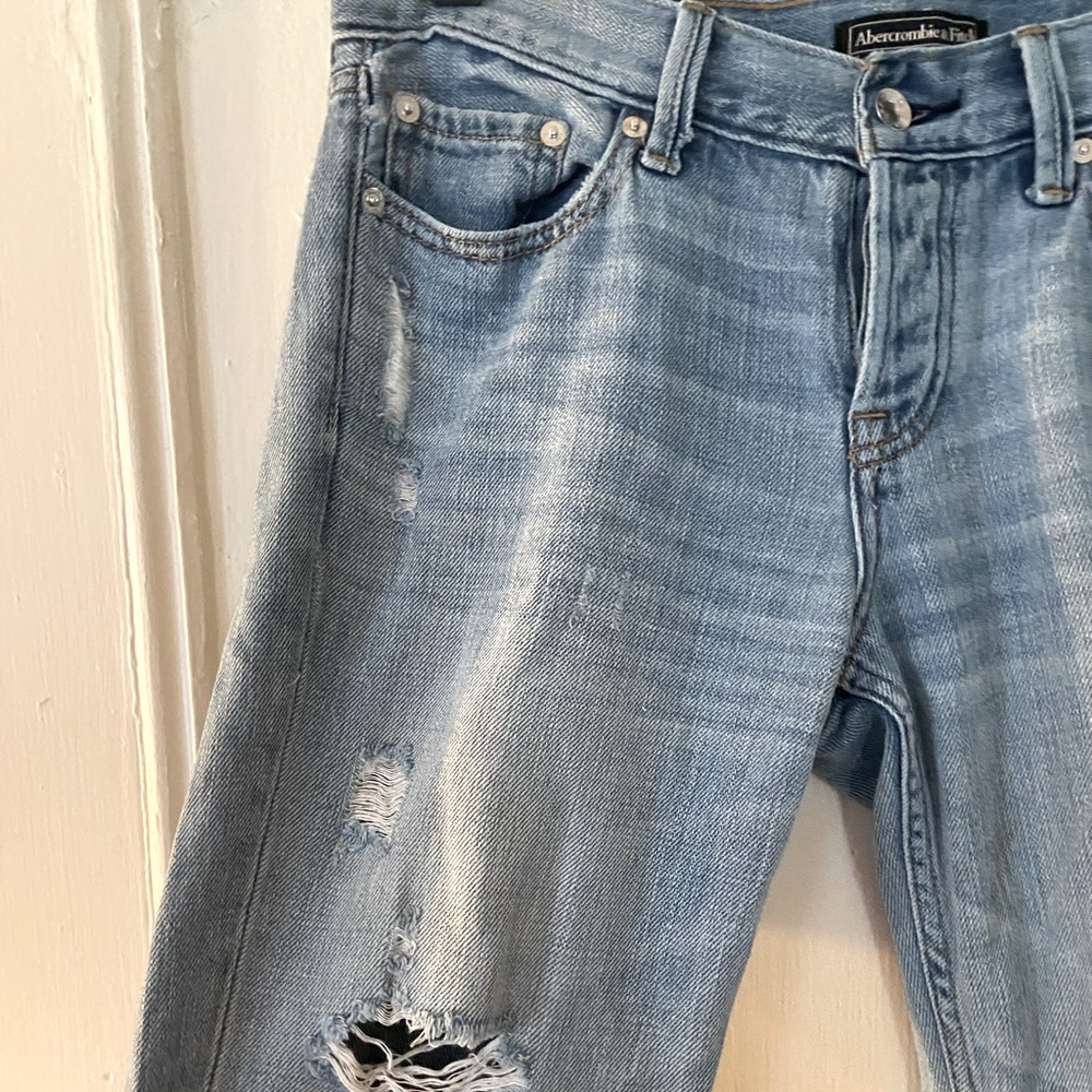 Distressed boyfriend jeans